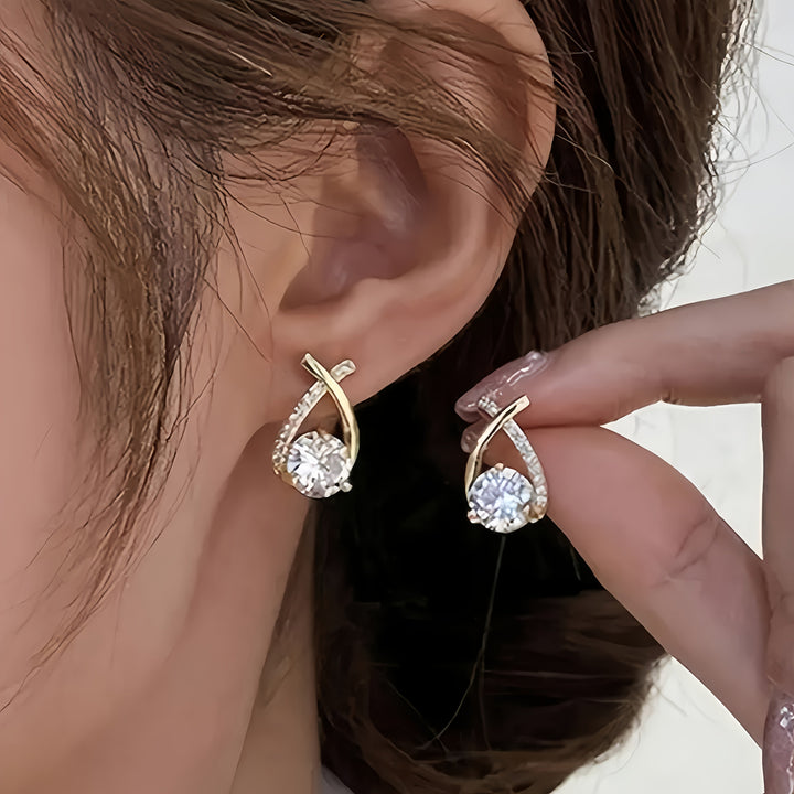 Pendientes con cruz de oro y zirconia