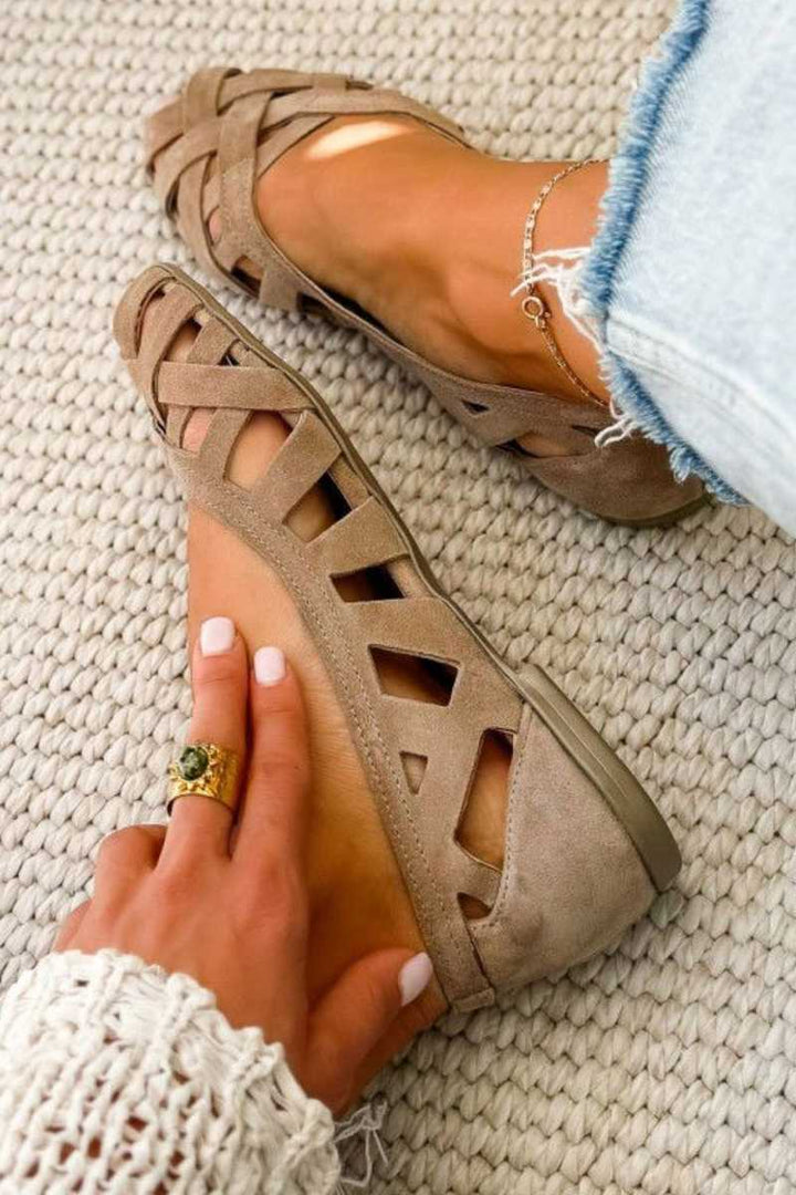 Hina | Sandalias planas con dedos al aire y material trenzado