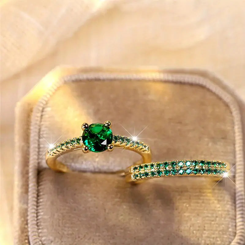 Conjunto de anillos Duo con Esmeralda en Oro
