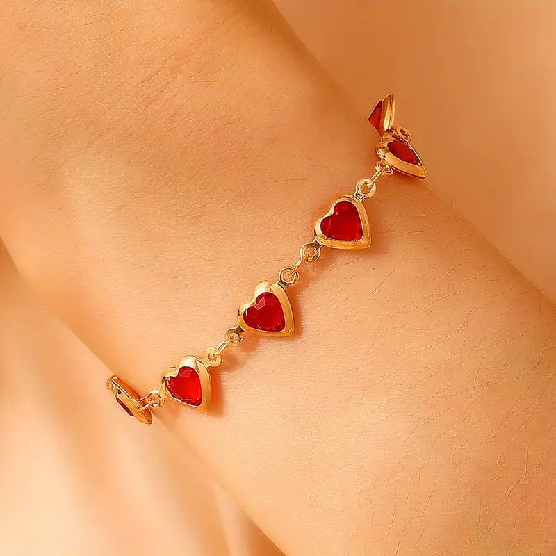 Pulsera en corazón de rubí dorado