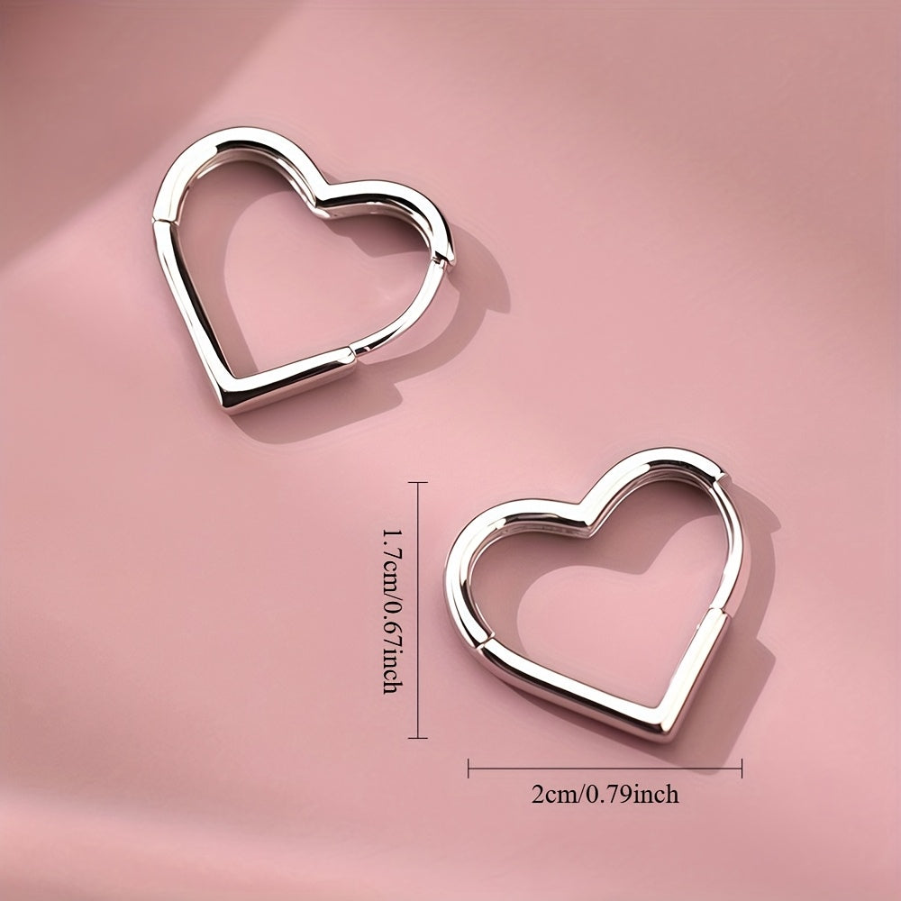 Pendientes en forma de corazón dorado de acero inoxidable