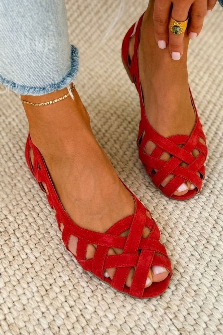 Hina | Sandalias planas con dedos al aire y material trenzado
