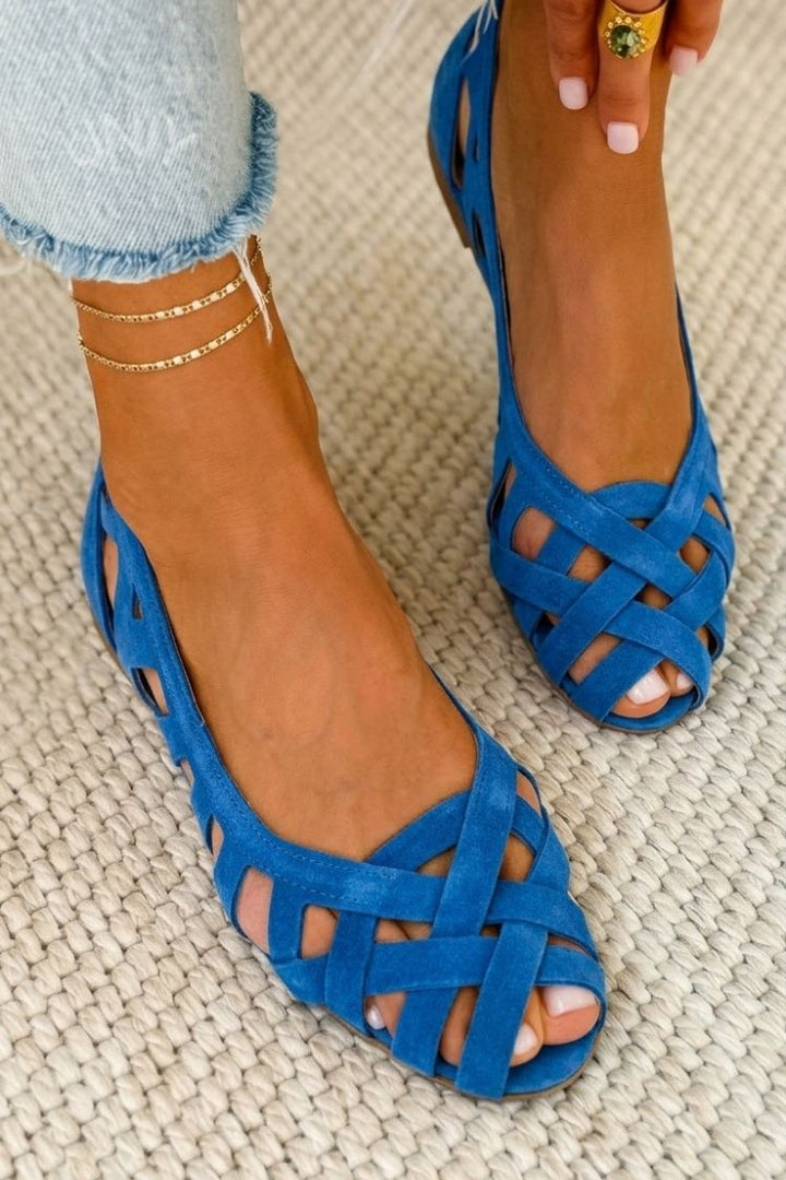 Hina | Sandalias planas con dedos al aire y material trenzado