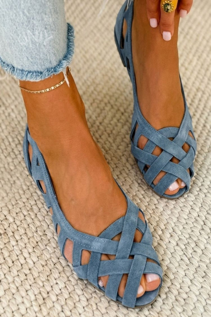 Hina | Sandalias planas con dedos al aire y material trenzado