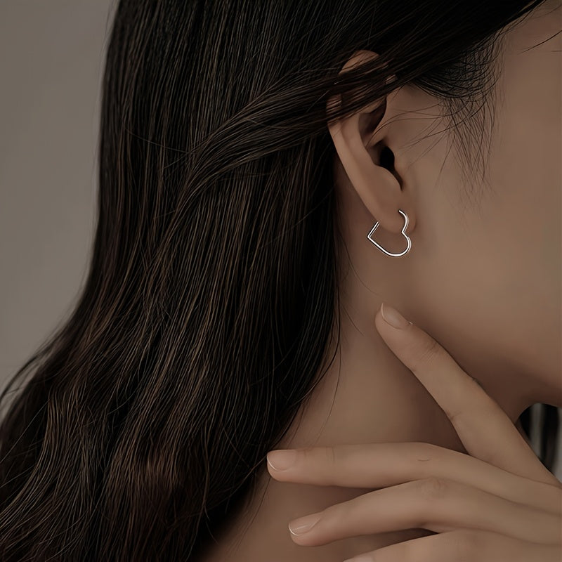 Pendientes en forma de corazón dorado de acero inoxidable