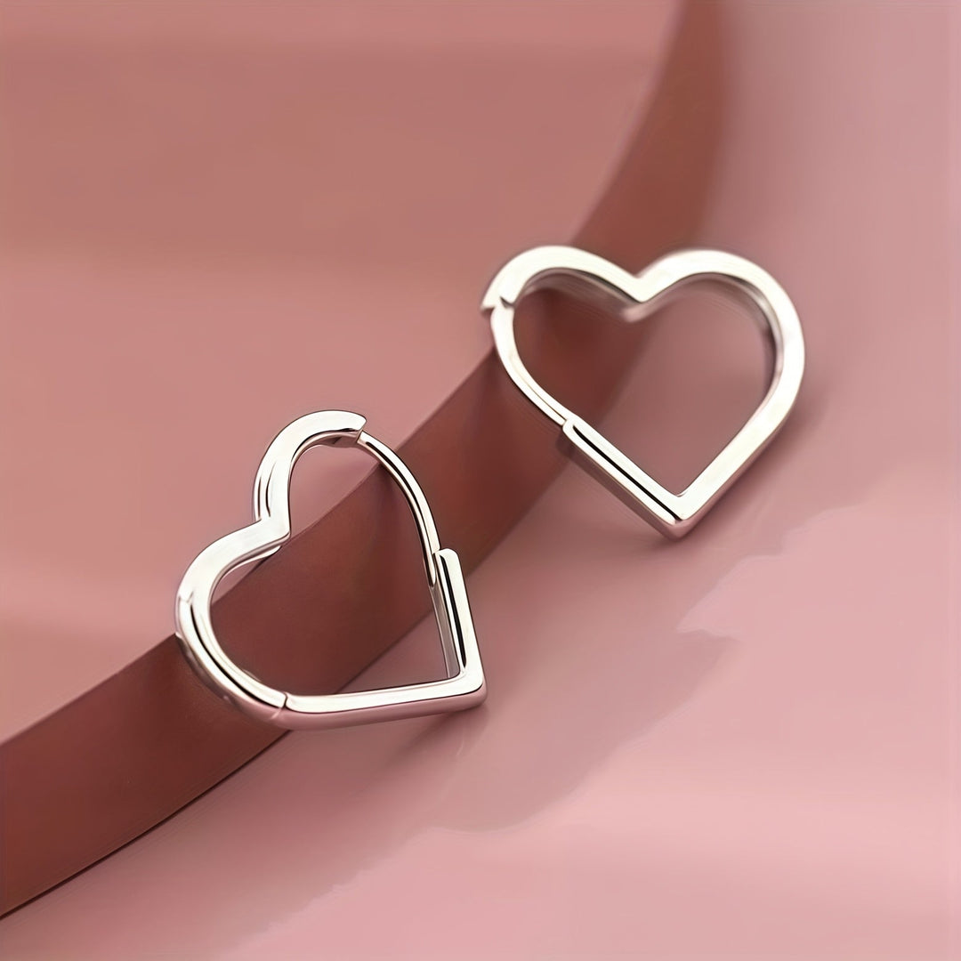 Pendientes en forma de corazón dorado de acero inoxidable