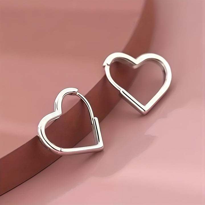 Pendientes en forma de corazón dorado de acero inoxidable