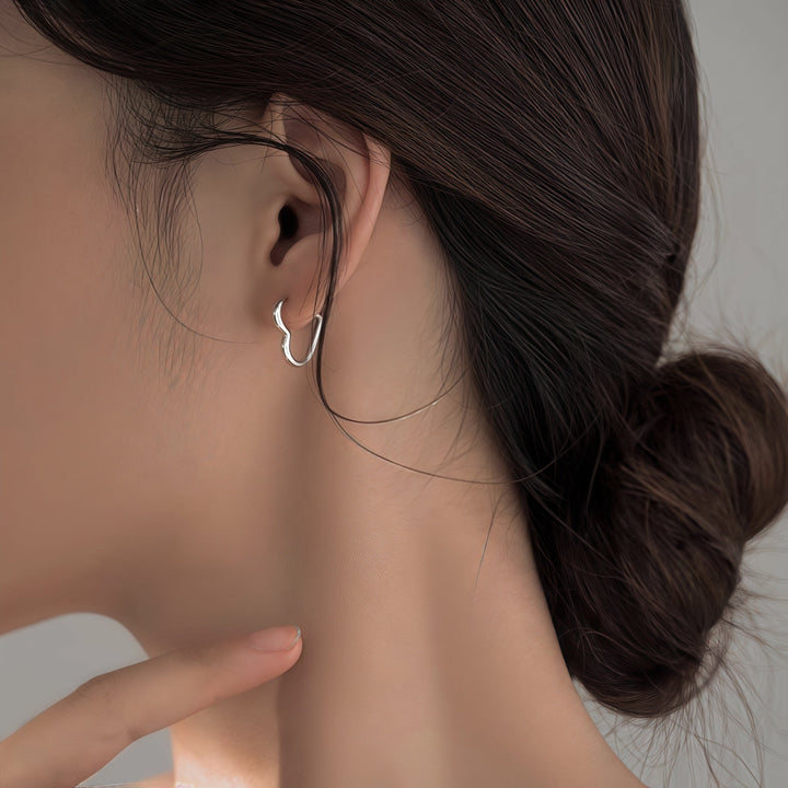 Pendientes en forma de corazón dorado de acero inoxidable