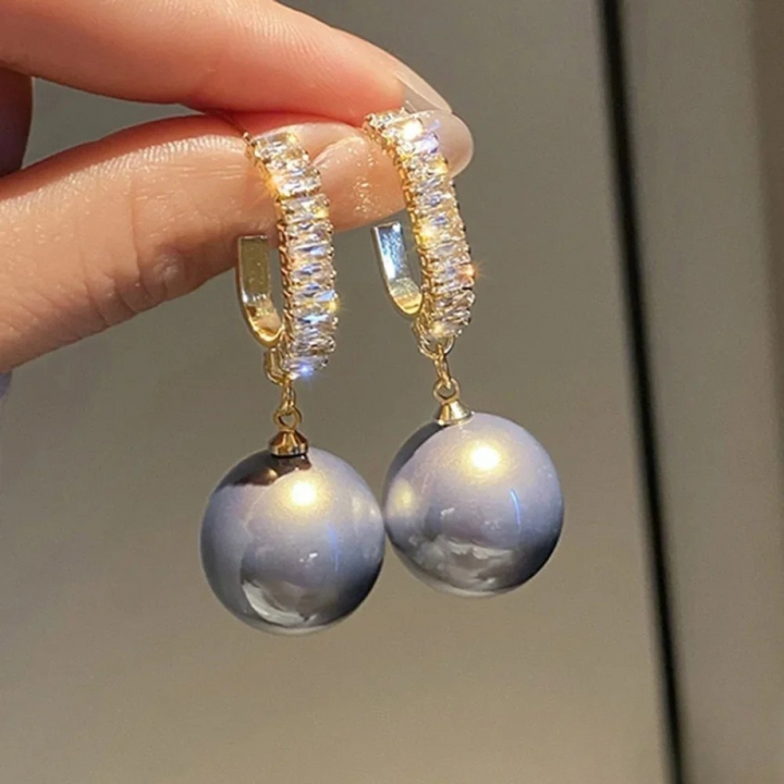 Pendientes elegantes con perla y circonita