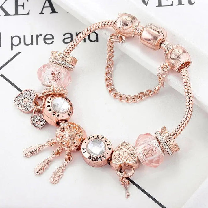 Pulsera Atrapa-Sueños Rosa con Charms de Plata Incluidos