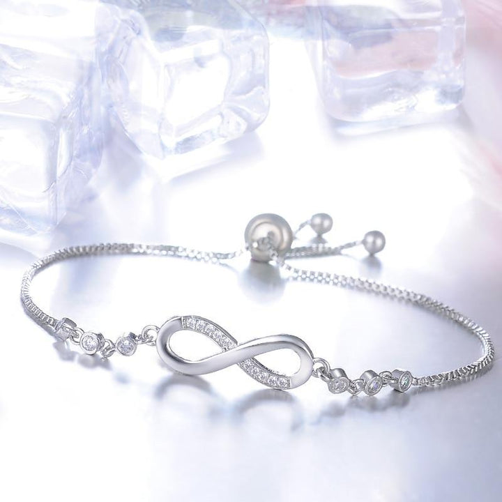 Pulsera ajustable chic en oro rosa en forma de símbolo del infinito