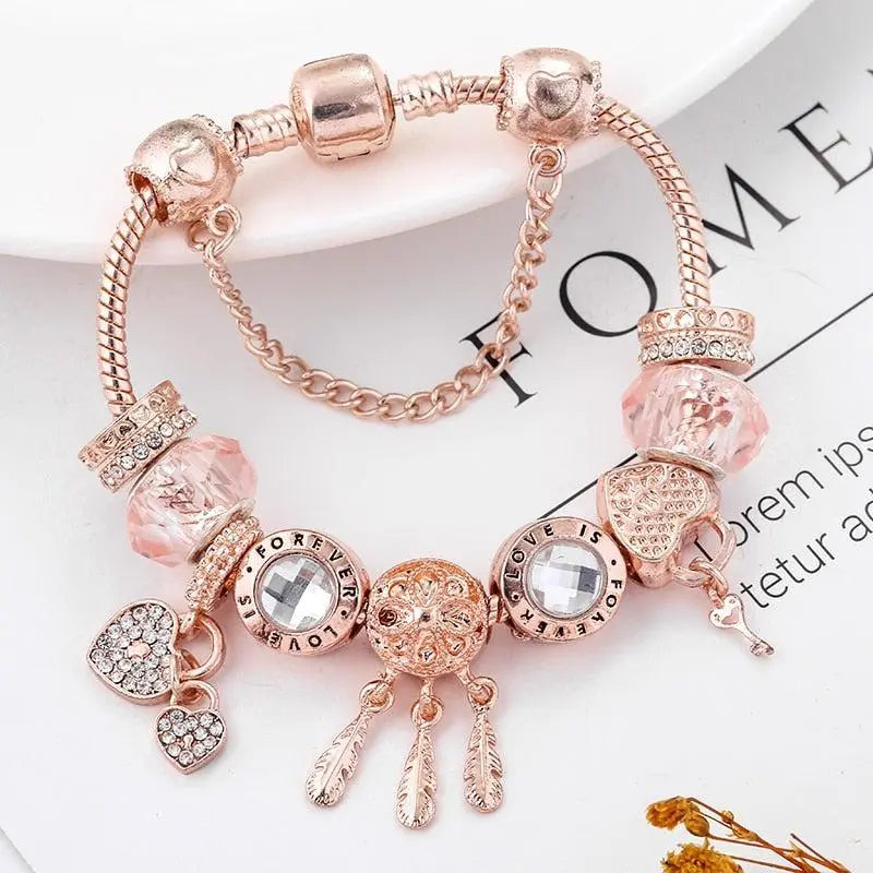 Pulsera Atrapa-Sueños Rosa con Charms de Plata Incluidos