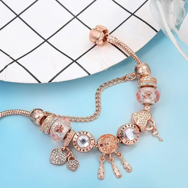 Pulsera Atrapa-Sueños Rosa con Charms de Plata Incluidos