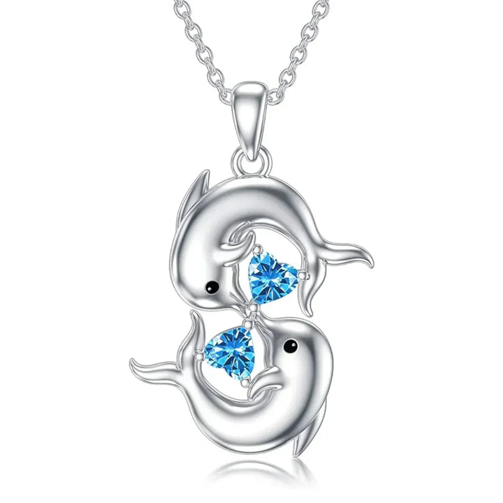 Collar de Plata con Delfines Dobles y Cristal Azul