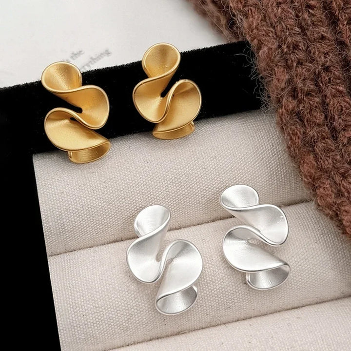 Pendientes de Flores de Plata y Oro de 18K