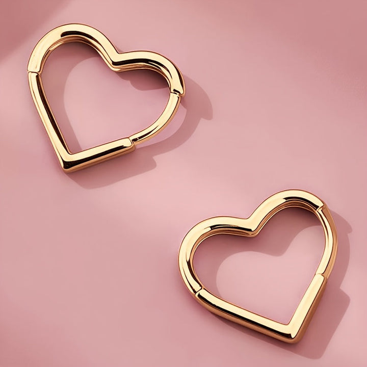 Pendientes en forma de corazón dorado de acero inoxidable