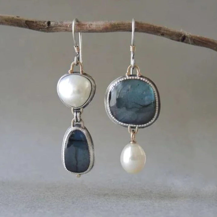 Pendientes de perlas azules graciosas
